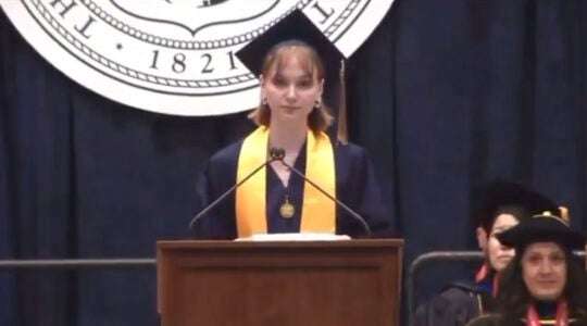 A college graduate delivers a commencement speech