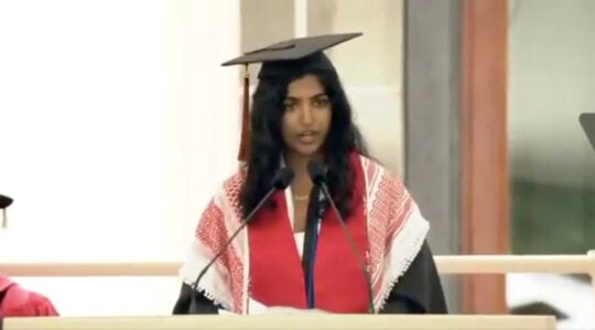 A student commencement speaker denounces MIT ties to Israel while wearing a keffiyeh