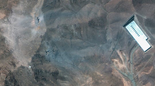 Craters and Ash Layer on Ridge Above Fordow Facility
