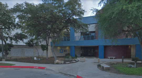 A photo of the front of the Barshop Jewish Community Center in San Antonio, Texas.