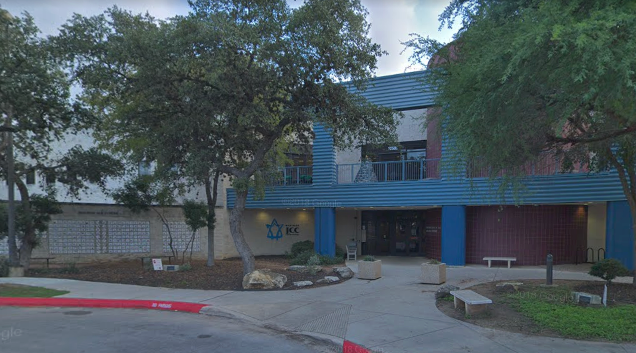 A photo of the front of the Barshop Jewish Community Center in San Antonio, Texas.