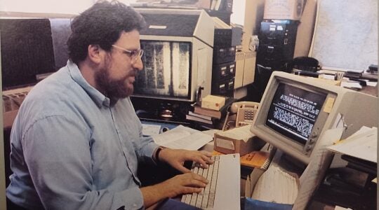Talmud expert Neil Danzig is seen at his computer in an undated photo.