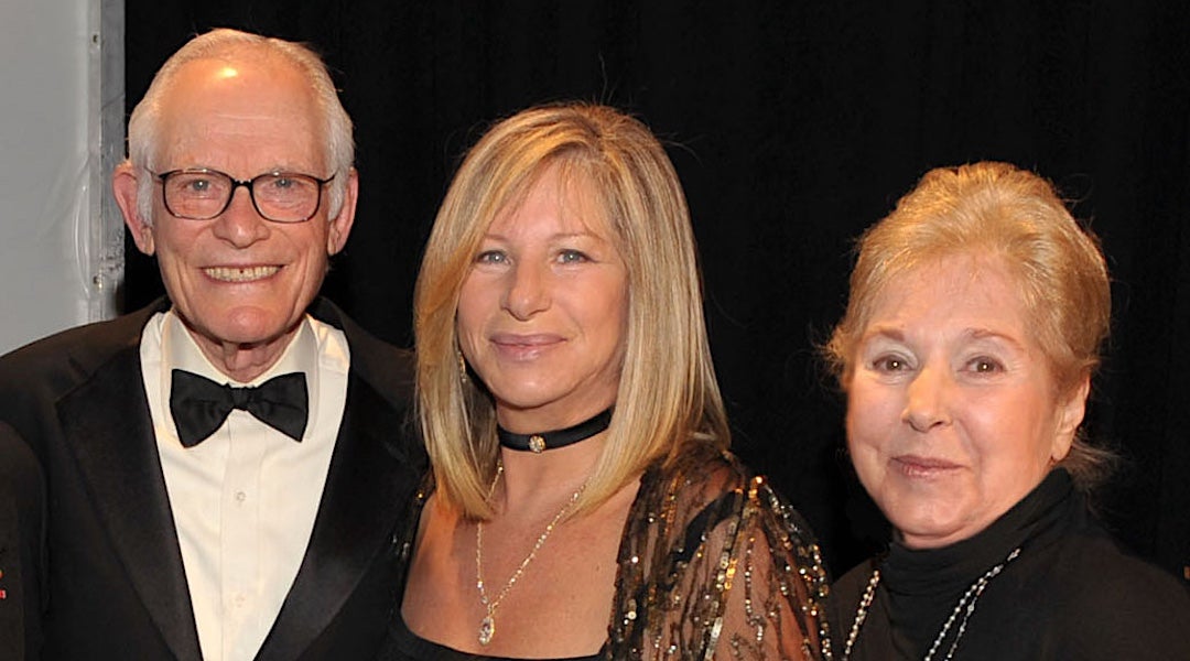 Barbra Streisand is seen posing with her friends and lyricists, Alan and Marilyn Bergman.