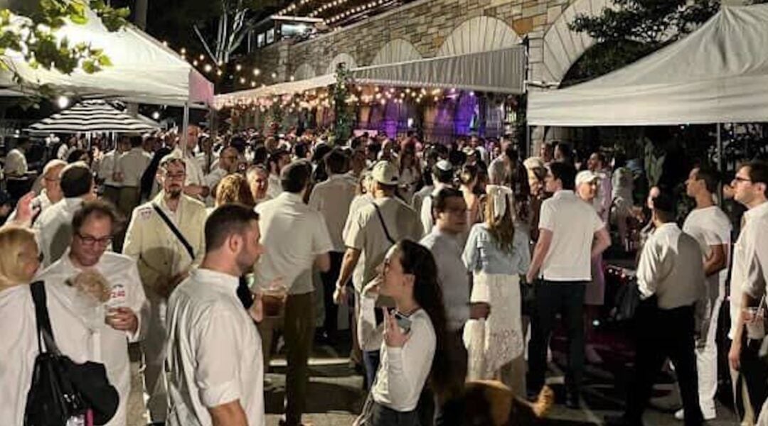 Crowd of people dressed in white