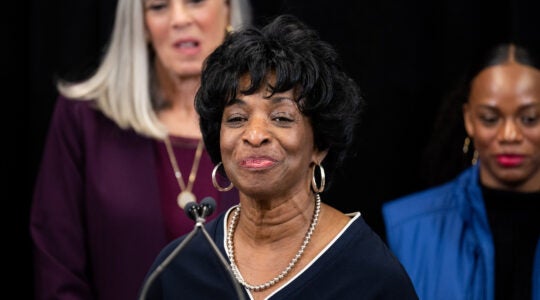 A photo of Valerie Foushee speaking into a microphone.