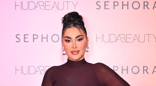 A photo of Huda Kattan.