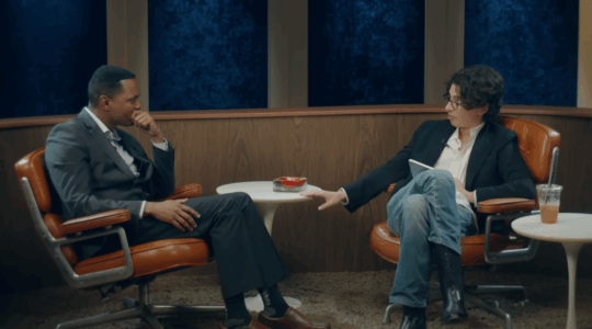 A photo of Adam Friedland and Ritchie Torres seated across from each other.