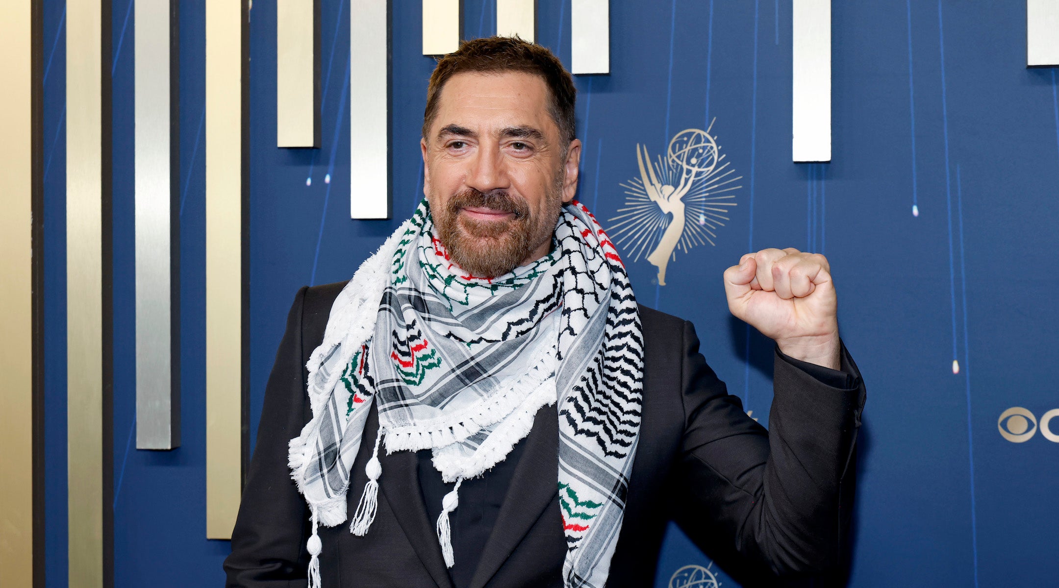 Javier Bardem wearing a keffiyeh on the Emmys red carpet