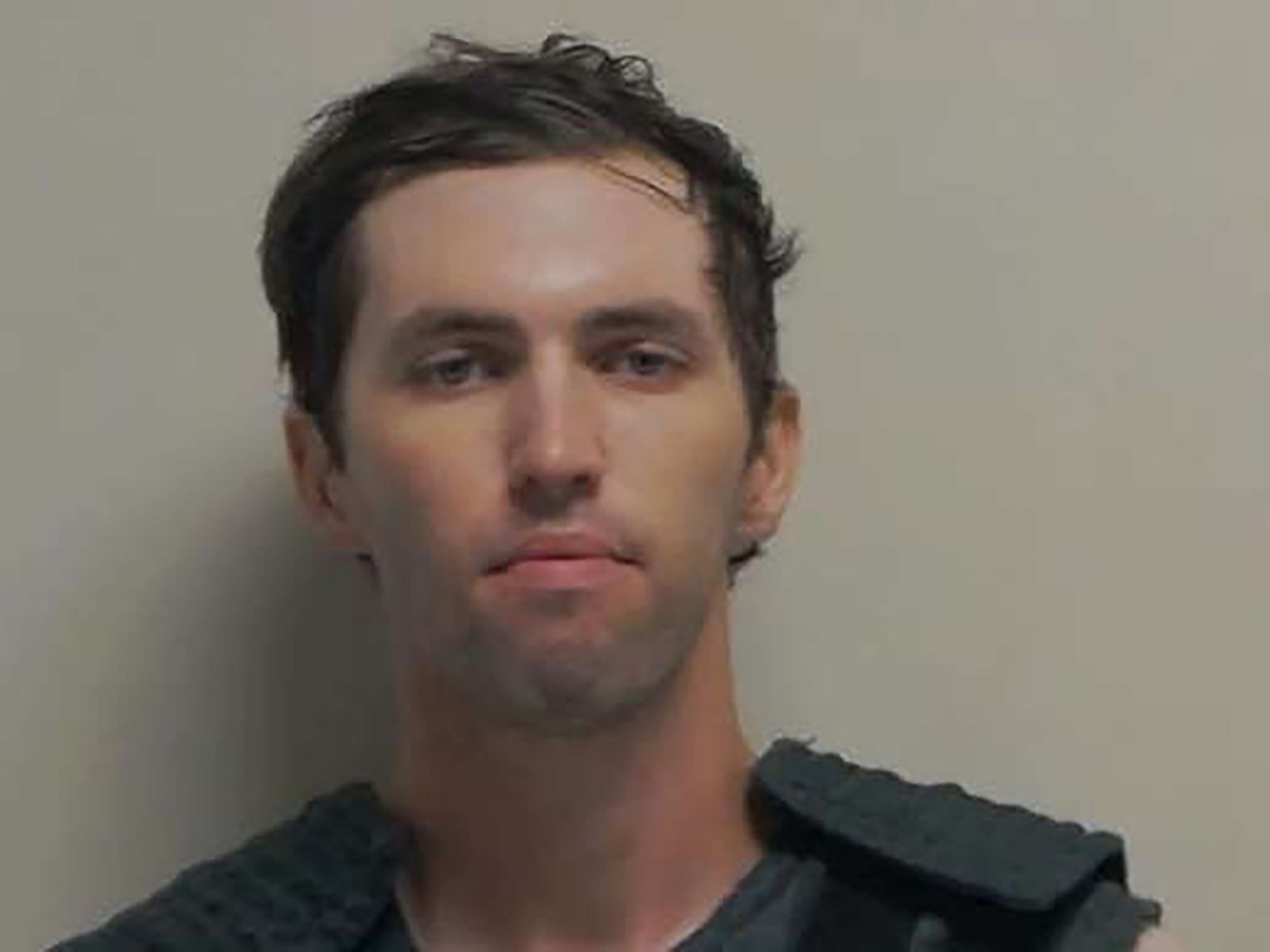 A mugshot of Charlie Kirk's suspected killer