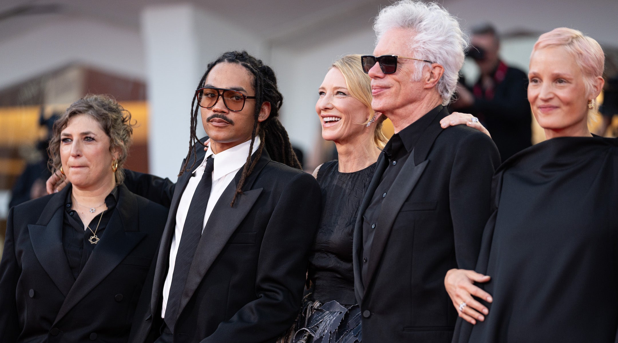 Celebrities including Mayim Bialik and Jim Jarmusch attend a red-carpet premiere