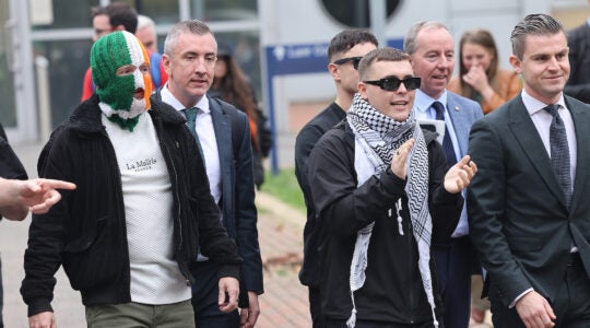 A photo of Liam O'Hanna clapping