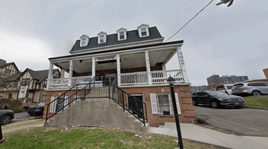 A photo of the front of the ZBT fraternity house.