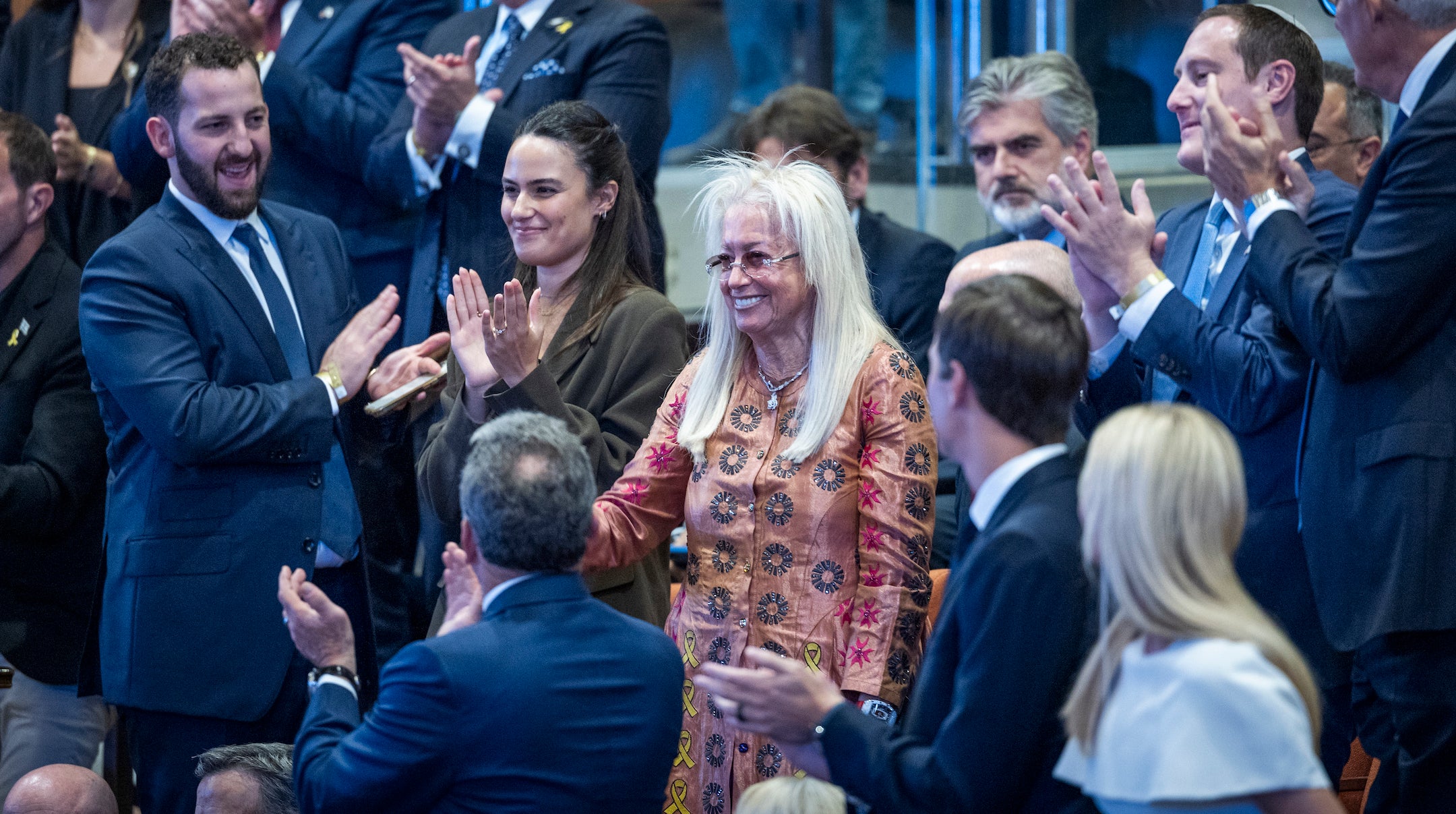 Miriam Adelson stands up at the Knesset