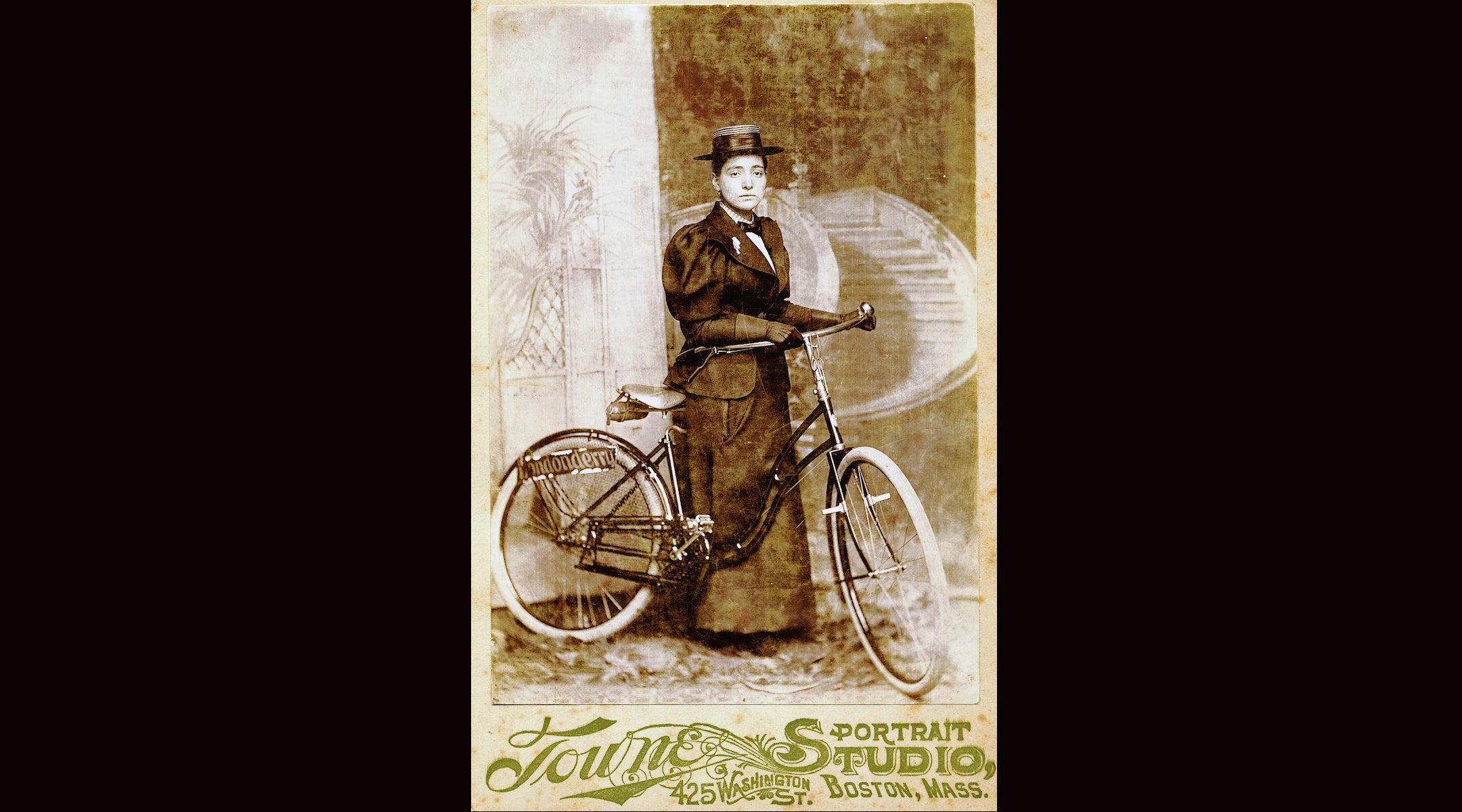 A late-1890s photo of a female cyclist