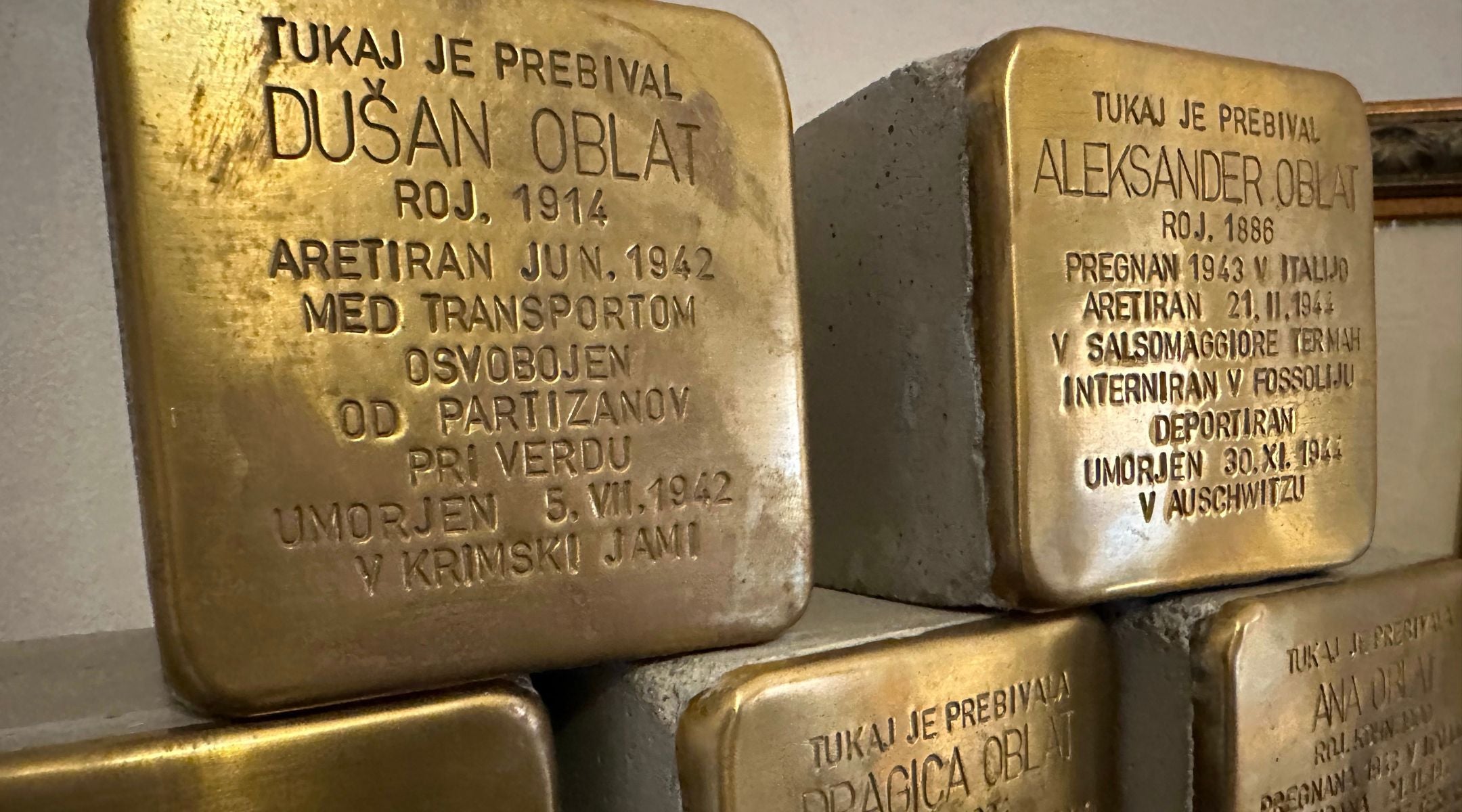 Brass “stumbling stones” honoring Slovene Jewish victims of the Holocaust.