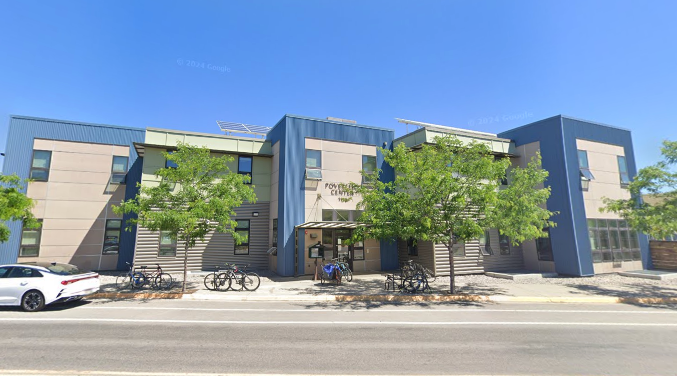 An image of the facade of the poverello center.
